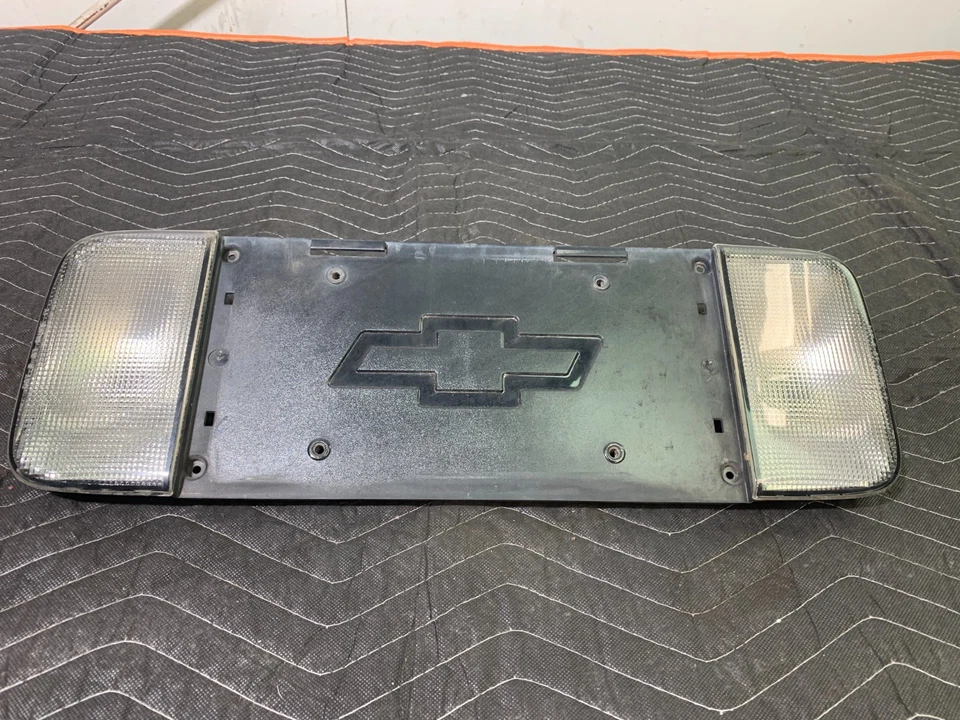 1997-2004 C5 Corvette Oem Rear License Plate Bracket Mount Reverse Lights Trim - Image 1 of 4
