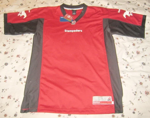 Calgary Stampeders CFL Canada Football League Reebok Red Jersey L Brand New Tags Cover