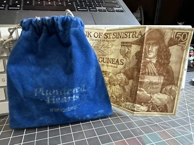 INFOCOM: Plundered Hearts Feelies: Velvet Pouch & 50 Guinea Note of St. Sinistra - Image 1 of 4