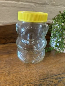 Vintage Snoopy Peanuts Peanut Butter Bear Shaped Glass Jar Yellow Plastic Lid - Bild 1 von 8