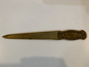 Vintage Lendenwirbelversicherungsagentur von J.E. Mergott Co. Messing Brieföffner - Bild 1 von 7