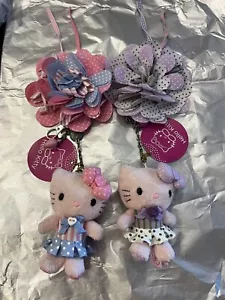 portachiavi hello kitty camomilla sanrio con fiore in tessuto e peluche - Bild 1 von 4