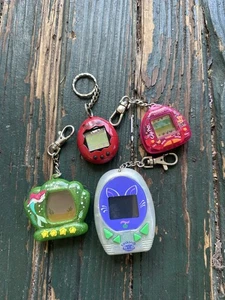 Tamagotchi Virtual Pet Mix Gigapet Mega Lot Untested Parts Repair - Picture 1 of 3