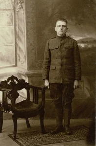 WWI Collection - studio portrait of a young solder in wool, unmarked uniform - Picture 1 of 1