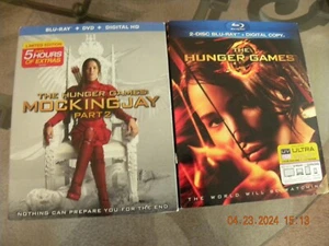 2 Discs The Hunger Games und Mockingjay Teil 2 beide NEU BLU-RAY mit Slipper - Bild 1 von 3