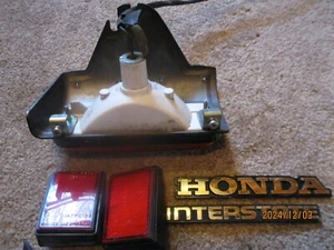 1982 HONDA GOLDWING GL1100 RIGHT SADDLE BAG LIGHT TRIM - Picture 1 of 3