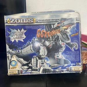 Neu im Karton Zoids Gojulas Giga 2002 Hasbro Actionfigur Modellbausatz #064 Teile versiegelt - Bild 1 von 6
