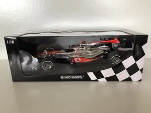 MINICHAMPS F1 1:18 McLaren MP4/25 2010 Jenson Button Formula 1 - Foto 1 di 3