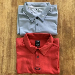 2 Oakley Sportshirts Herren XL blau & rot gestreift kurz Polo Golf Performance - Bild 1 von 12