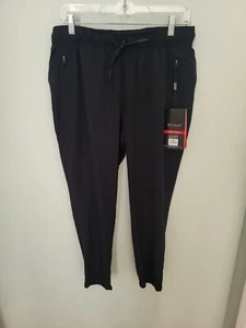 Pantalones de chándal Spyder para mujer activos ligeros con cremallera bolsillos negros medianos nuevos - Imagen 1 de 16