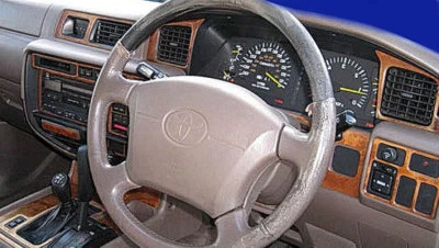 KIT DE MOLDURAS DE TABLERO CON VOLANTE A LA DERECHA PARA TOYOTA LAND CRUISER 1995-1997 MADERA CARBONO Foto 1 de 4