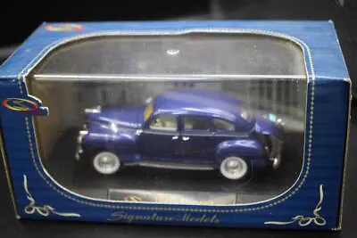 1/32 Scale Diecast Signature Models 1941 Plymouth Blue 1:32 - Image 1 of 3