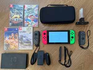 Nintendo Switch Konsole Bundle 4 Controller 5 Spiele inklusive & Tragetasche - Bild 1 von 17