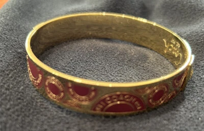 Brazalete Brazalete COACH Letra C LOGO Firma Granate/Rojo Esmalte y Tono Dorado Foto 1 de 4