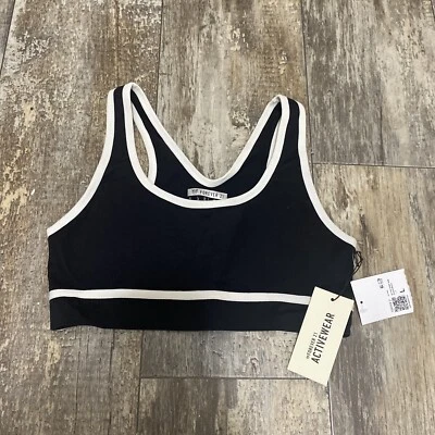 Sujetador deportivo acolchado forever 21 talla grande nuevo con etiquetas negro con banda blanca Foto 1 de 4