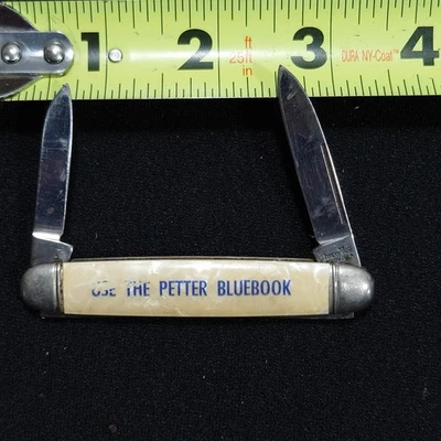 Cuchillo Plegable Imperial Prov RI USA Petter Libro Azul Publicidad Foto 1 de 4