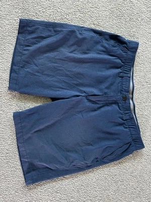 UNDER ARMOUR PANTALONES CORTOS DE GOLF CHINOS PARA HOMBRE TALLA 40 10” ELÁSTICOS RENDIMIENTO AZUL Foto 1 de 4