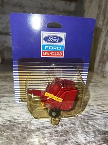 Ford New Holland 660 Rundballenpresse Maßstabsmodelle im Maßstab 1:64 - Bild 1 von 5