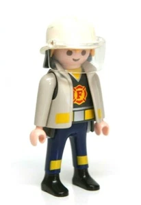 Playmobil Figur Feuerwache LKW Feuerwehrmann Feuerwehrmann mit Helm Schild Jacke - Bild 1 von 1
