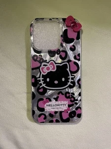 Coque Hello Kitty iPhone 15 Pro imprimée léopard plastique transparent ruban rose - Photo 1/2