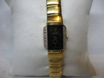 VINTAGE LADIES SEIKO DIAMOND BLACK DIAL  TEACHERS WATCH WITH AN APPLE LOGO - Image 1 of 4