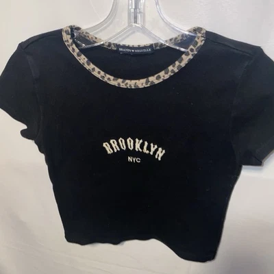 Camiseta corta para bebé Brandy Melville Brooklyn NYC con ribete de leopardo talla única Y2K Foto 1 de 4