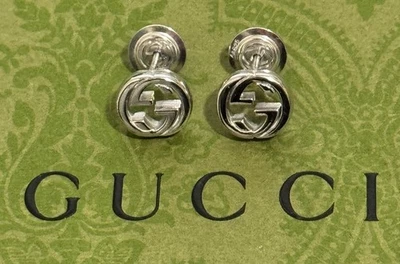 Pendientes Gucci entrelazados en G tachuelas de plata de ley 925 hechos en Italia Foto 1 de 3