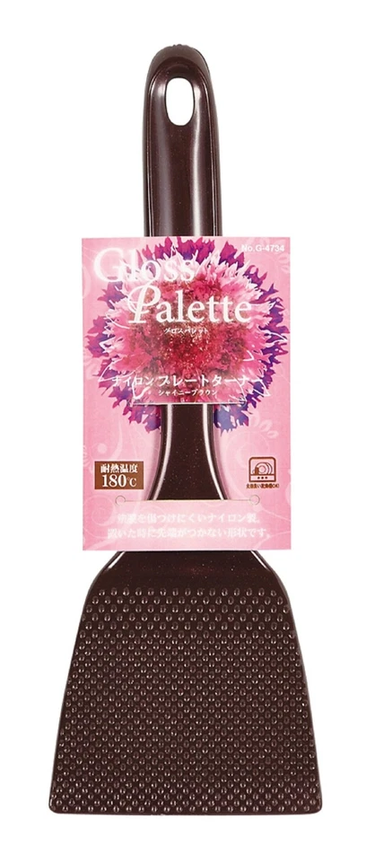 Turner de metal perlado marrón brillante Foto 1 de 1