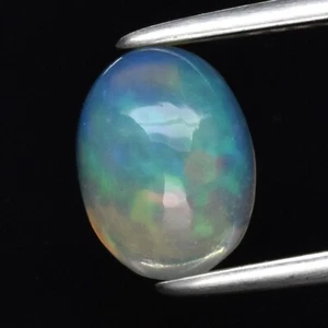 0.87ct 8x6mm Oval Cabochon Natural Play-of-Color Crystal Opal, Ethiopia - Imagen 1 de 1