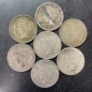 7 1922 $1 UNITED STATES GENUINE PEACE 90% SILVER DOLLAR MIXED MINT LOT KM# 150 - Picture 1 of 4