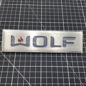 815575 --Oem Wolf Range Stufa Forno Adesivo Targa Logo **NUOVO** - Foto 1 di 3