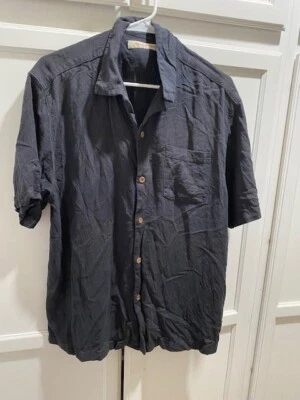 Camisa de vestir Tommy Bahamma grande negra lisa de abajo con bolsillo frontal usada  Foto 1 de 4
