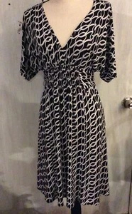 B. Abito SMART DONNA nero/bianco poli maglia corpetto avvolgente GRANDE* - Foto 1 di 3