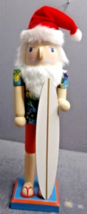 FERIENHAUS 14 ZOLL WEIHNACHTEN NUSSKNACKER - SURFENDER WEIHNACHTSMANN MIT SURFBRETT - Bild 1 von 4