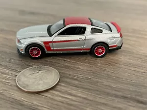 Autoworld Silver/Red 2012 Ford Mustang Boss 302 - Rubber Tires 1:64 - Picture 1 of 9