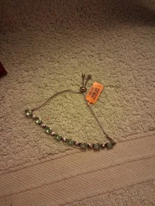 Blue Topaz Infinity Link Adjustable Bolo Style Bracelet... - Picture 1 of 4