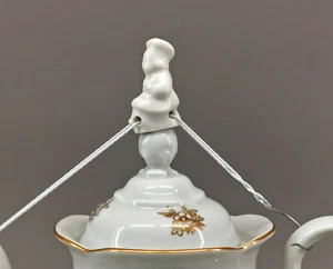 9986426 Porzellan Figur Tropfen-Fänger Koch weiß Lindner H5cm - Bild 1 von 3