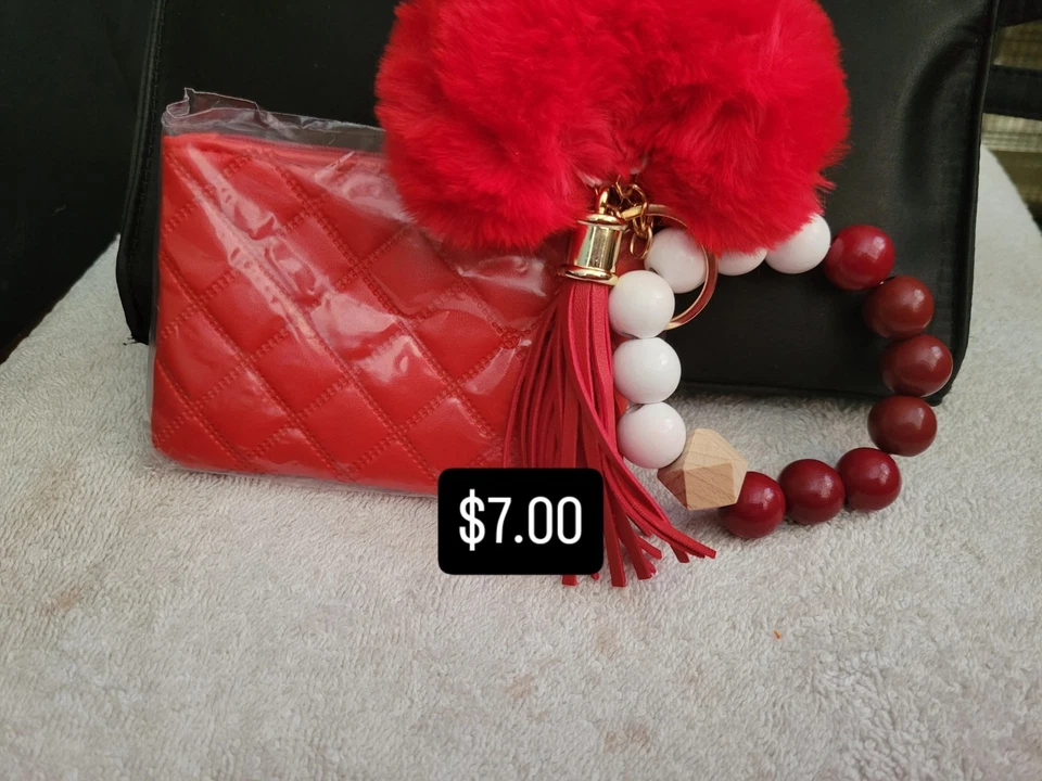 CARTERA LLAVERO CUENTAS ROJAS CON PLUMA Y ESPONJA Foto 1 de 1