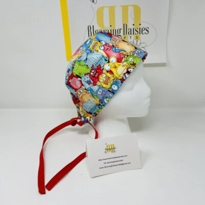 Monsters Cute - Glow in the Dark Skull Unisex Skull/Chemo Surgical Scrub Hat/Cap - Image 1 of 3