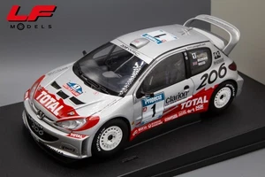 1:18 Peugeot 206 WRC Rally New Zeland 2002 R. Burns - Autoart - Foto 1 di 5
