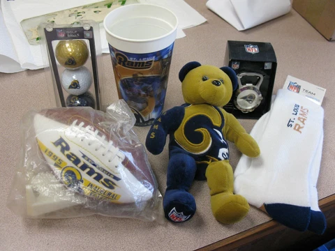 ST LOUIS RAMS LOT ASSORTMENT-CUP,MINI FOOTBALL, CLIP WATCH, SOCKS,BEAR Cover