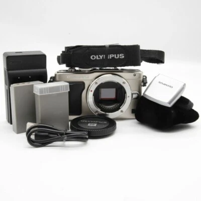 Cámara SLR Olympus PEN Lite E-PL5 sin espejo plateada probada con batería, cargador Foto 1 de 4