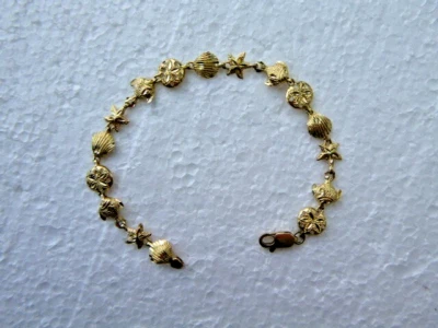 10k Yellow Gold Sea Life Bracelet Nautical Starfish Sand Dollar Sea Shell Fish - Image 1 of 4