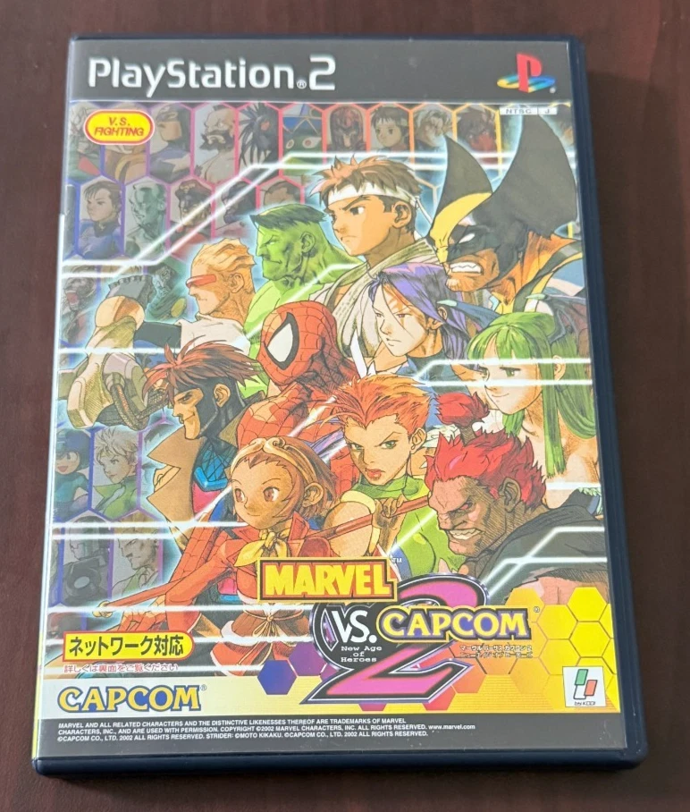 Marvel vs Capcom 2 (JP PlayStation 2, 2002) в коробке - Изображение 1 из 3