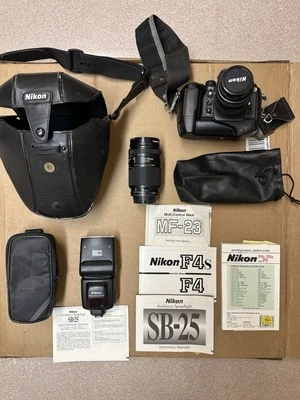 Nikon F4 - Excelente estado. Lente extra, parte posterior de control múltiple, flash SB-25 Foto 1 de 4