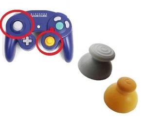 GameCube Joystick Caps 1 links [grau] und 1 rechts [gelb] Ersatzteile - Bild 1 von 1