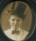 WOMAN IN TIP HAT, BOW TIE. SMALL OVAL SILVER PRINT, PERIOD MAT.