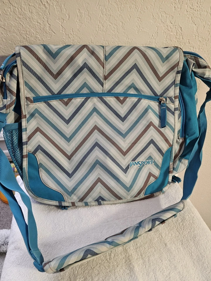 Bolso de mensajero para computadora Jansport correa ajustable, verde azulado/blanco Foto 1 de 4