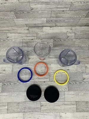 Magic Bullet Cups… 3 12 Ounce Cups-2 Have Handles, 3 Lip Rings, 2 Shaker Lids - Image 1 of 4