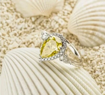 Anillo de compromiso de diamantes canarios de corte pera de 1,50 quilates de oro blanco de 14 quilates Foto 1 de 3